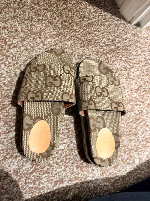  — Gucci platform sliders