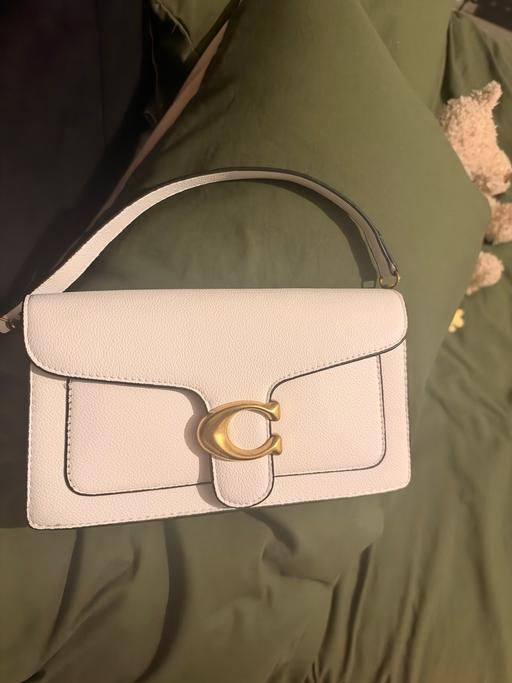  — White Coach bag