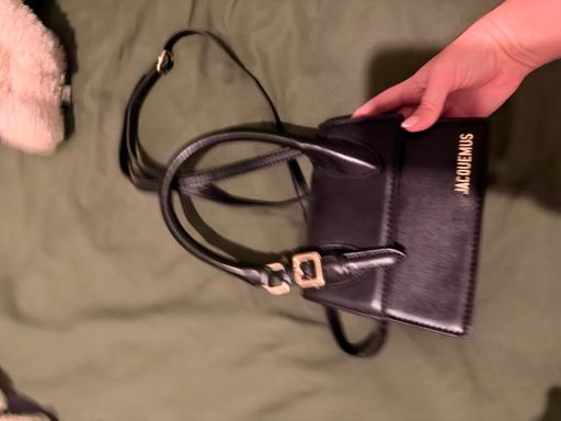  — Black bag