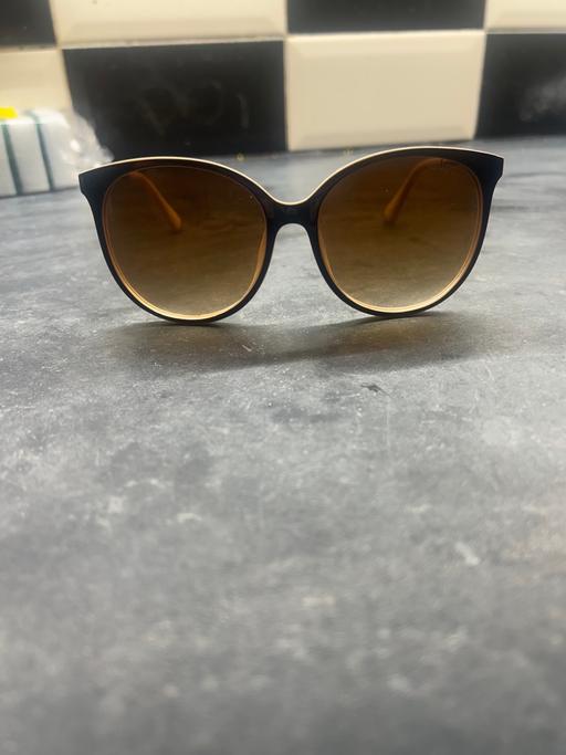  — Gucci Sunglasses