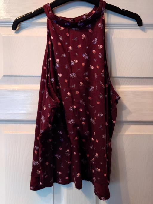  — Women's floral sleeveless top size 16