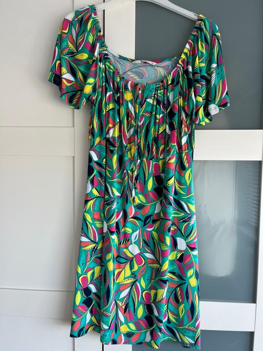  — Dress