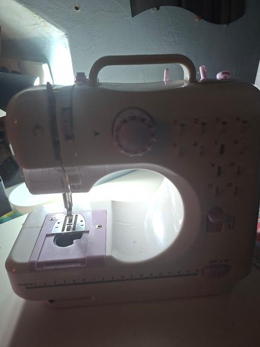  — electric sewing machine with foot pedal