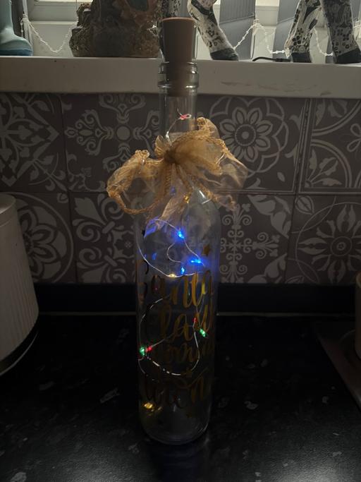  — Light Christmas bottle