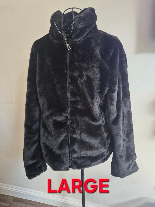  — large faux fur coat