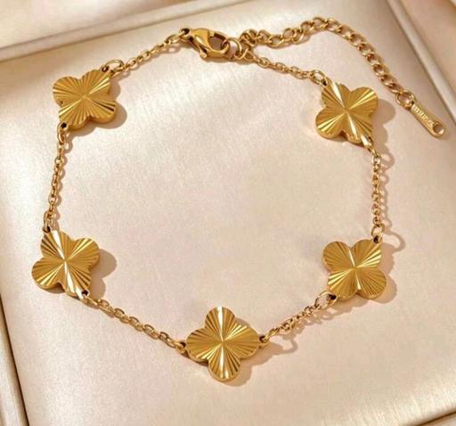  — golden bracelet