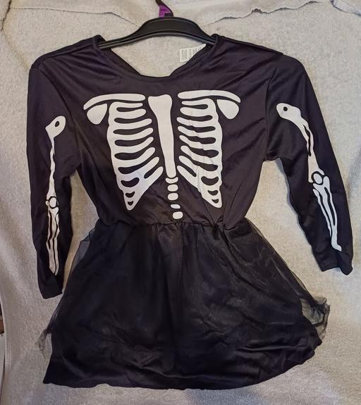  — Girls skeleton dress. age 6-7 or 8-9. new
