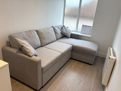  — Nearly brand new sofa bed with storage ONO
