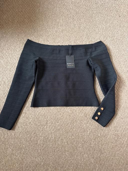  — RiverIsland Top