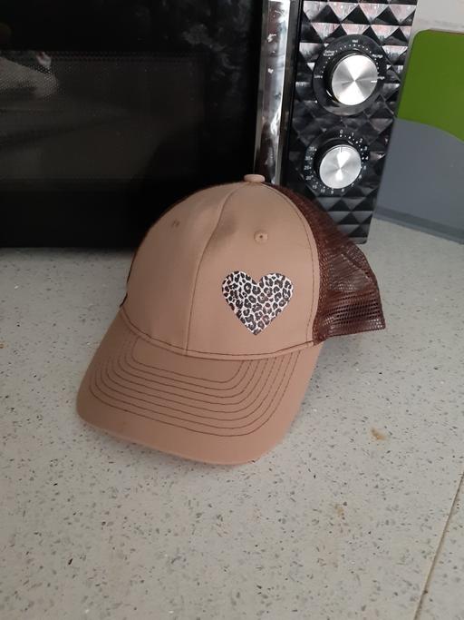  — cap
