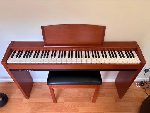  — electric piano
