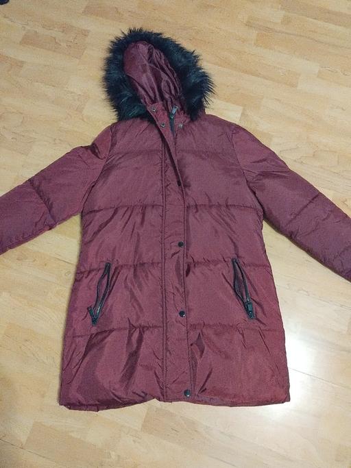  — Coat 14.