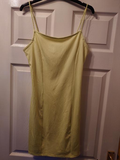  — Women's lime green strap top size 14