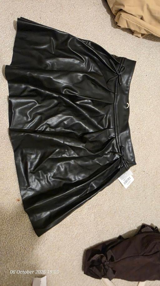  — black skirt