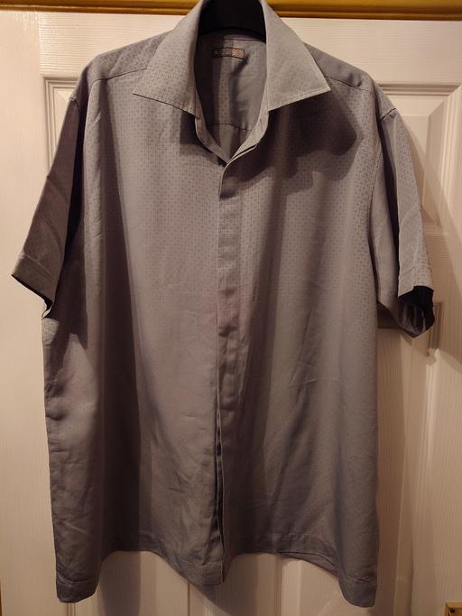  — Mens silver shirt size XL