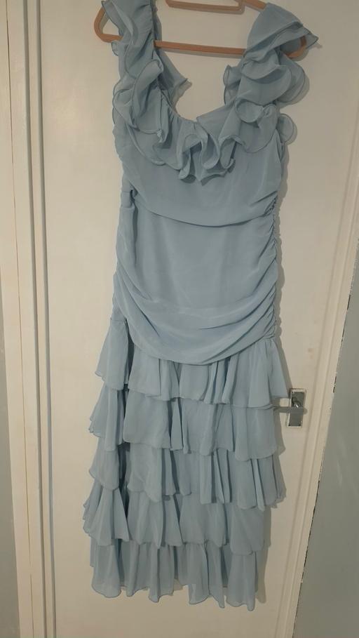  — frilly  baby blue dress
