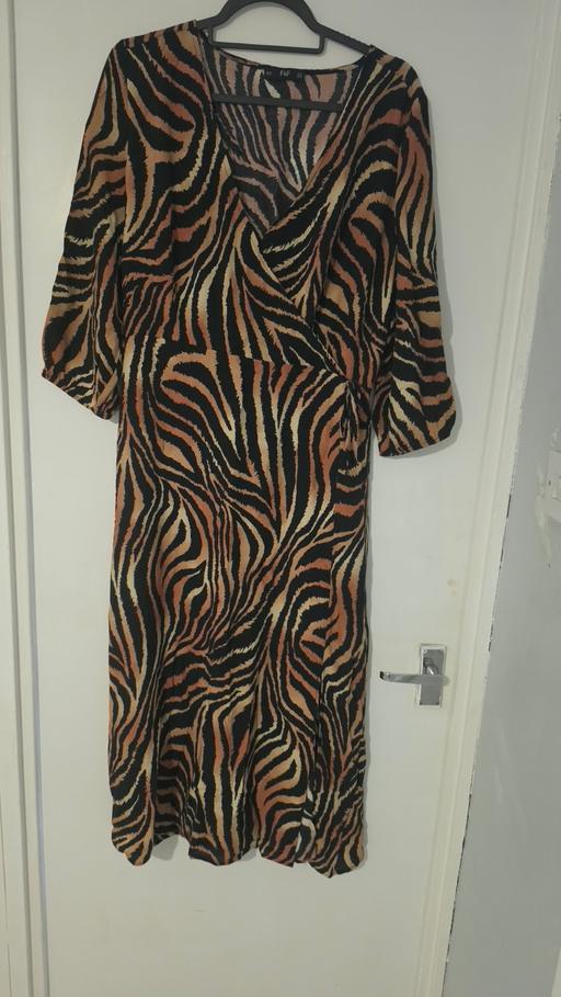  — animal print dress