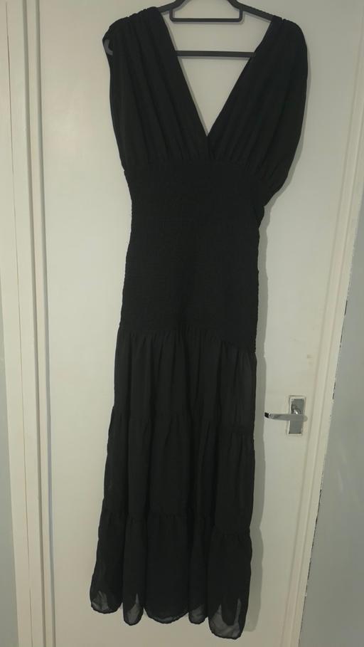  — black frilly dress