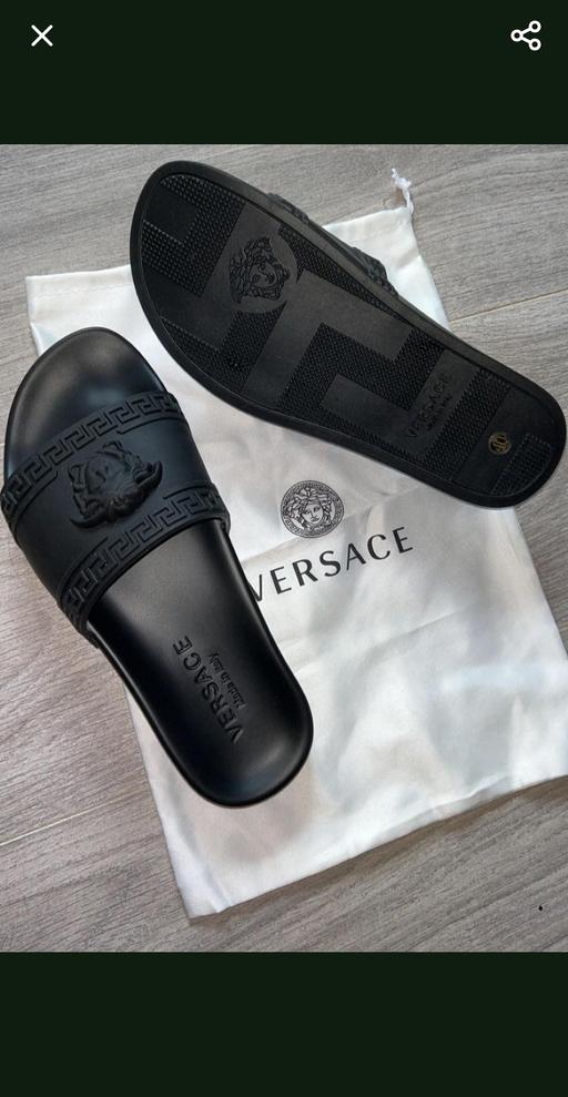  — versace sliders
