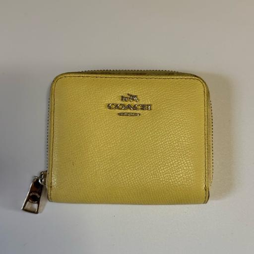  — Coach yellow coin purse
