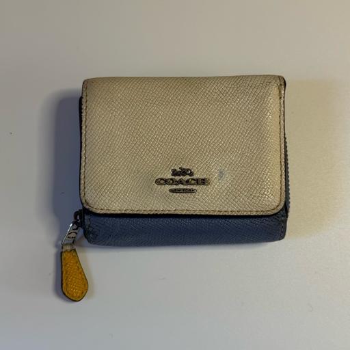  — White, blue & yellow coach trifold purse