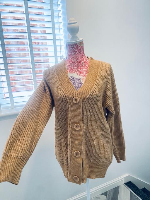  — (14) TU CARDIGAN