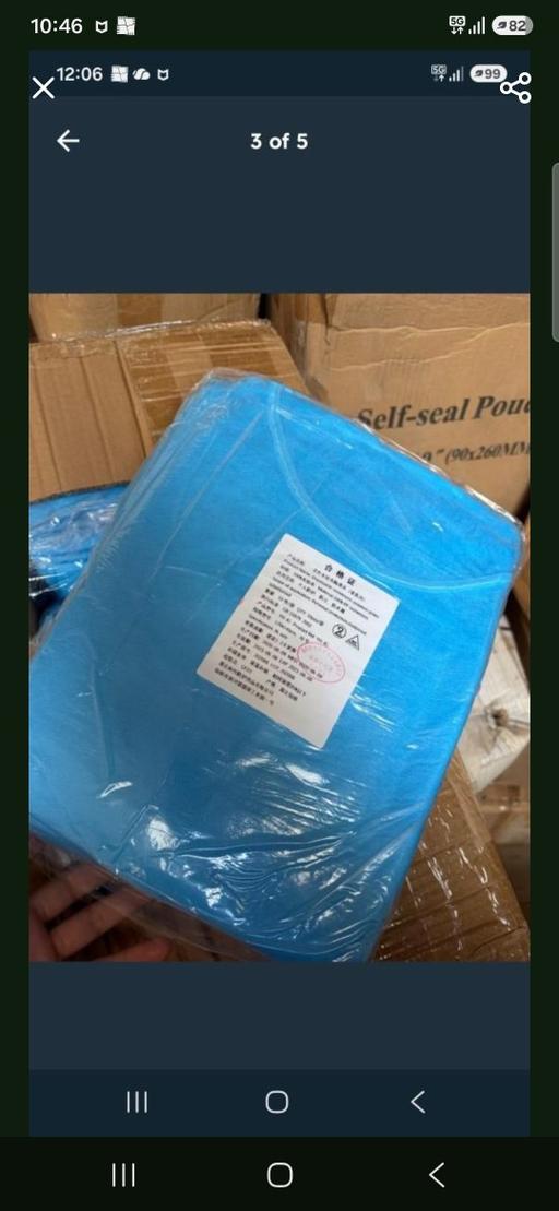  — Disposable isolation gown in blue
