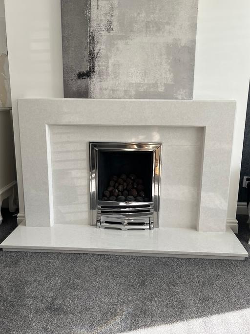  — White / grey marble fireplace and fire