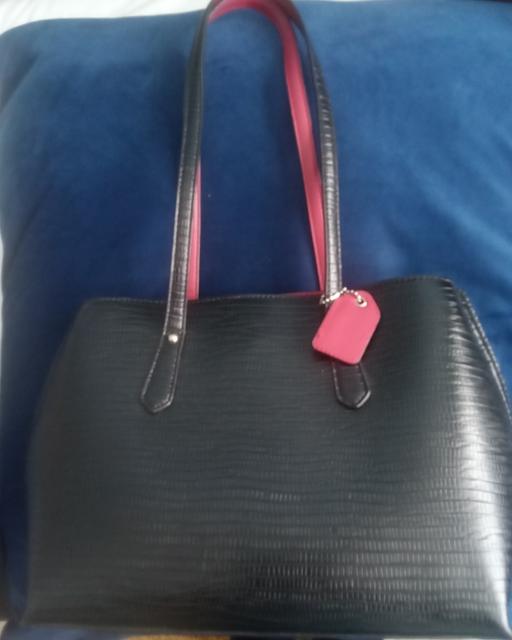  — handbag