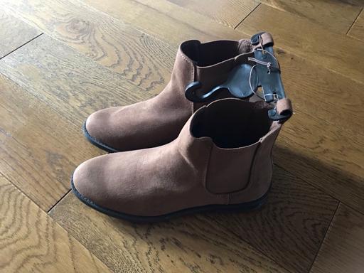  — Boots