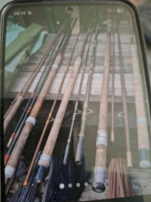  — assorted fishing tackle rods, pole  net,and