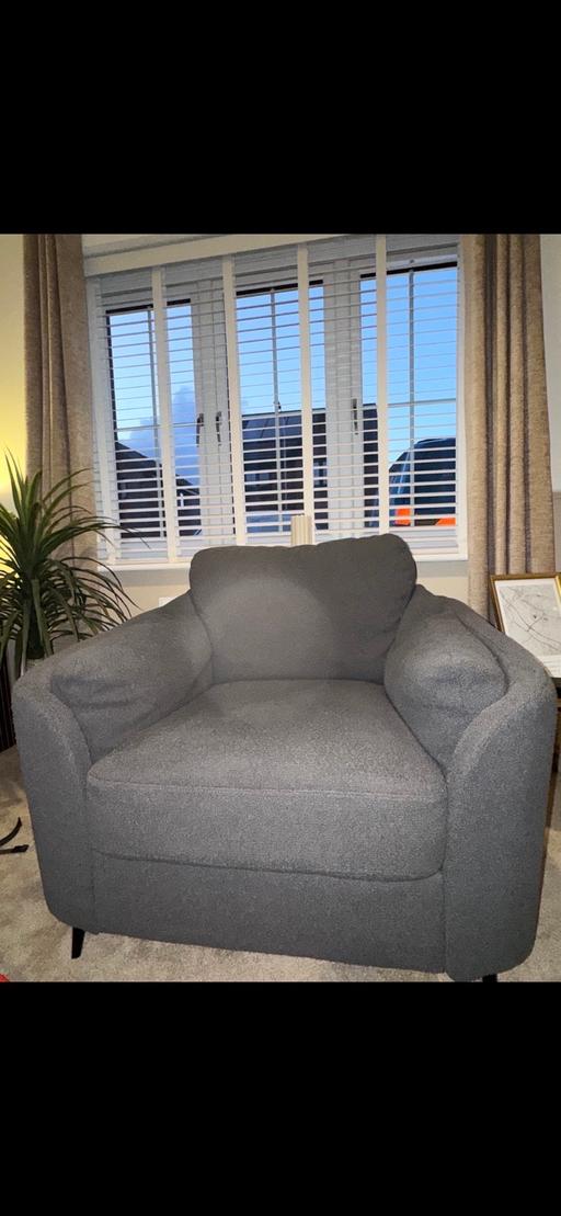  — Dark grey armchair with metal legs