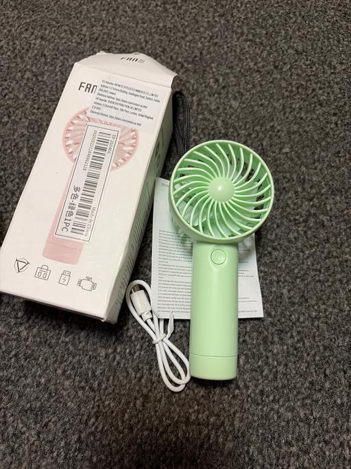  — Hand fan