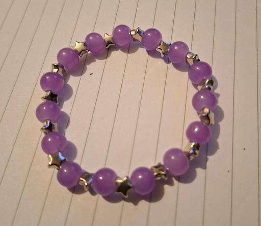  — purple beaded bracelet