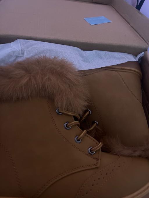  — Brand new boots