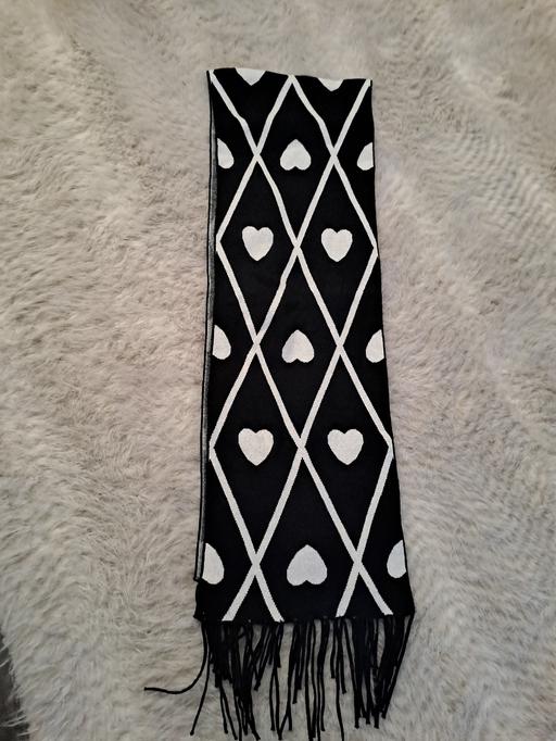  — new scarf