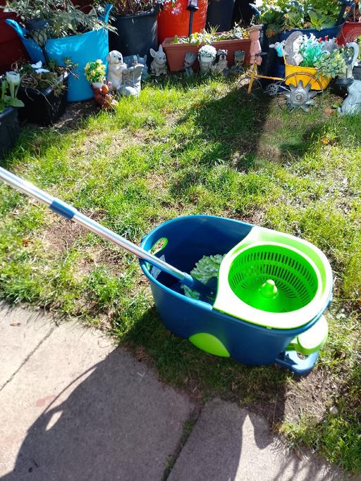  — swivel mop