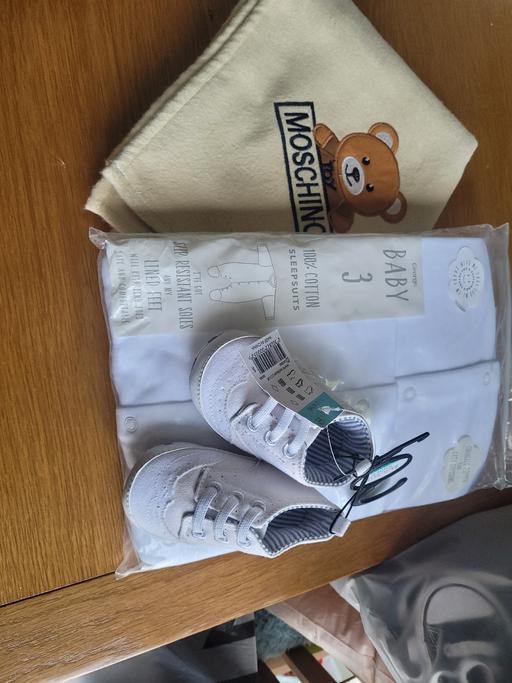  — baby clothes.