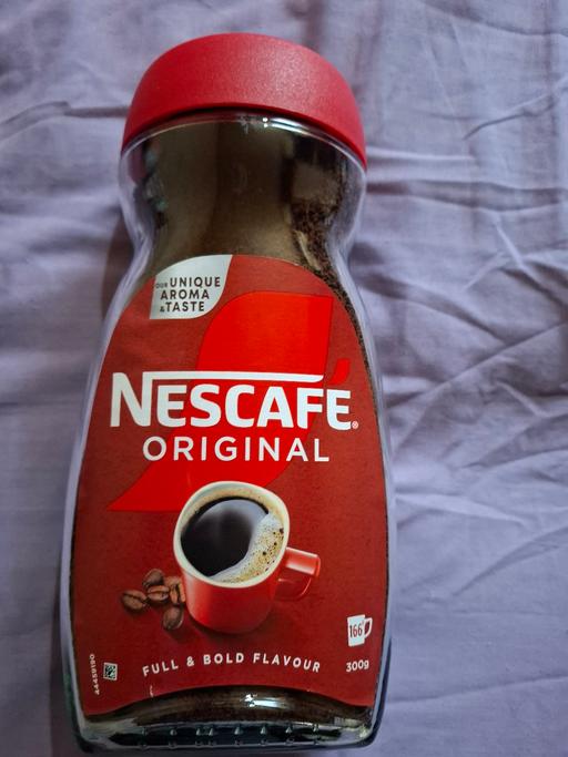  — NESCAFE