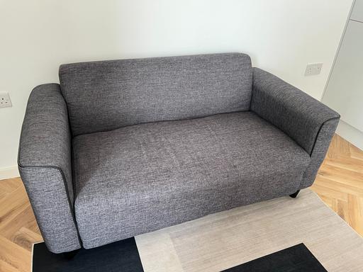  — Grey 2-Seater Sofa – Good Condition