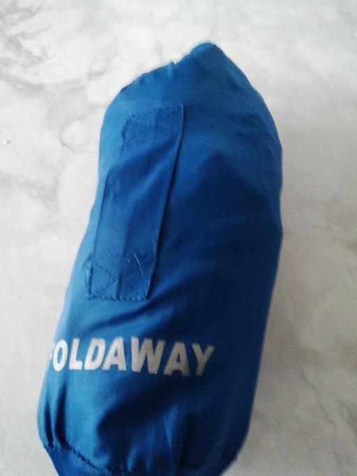  — Fold away coat in a bag size *XL*