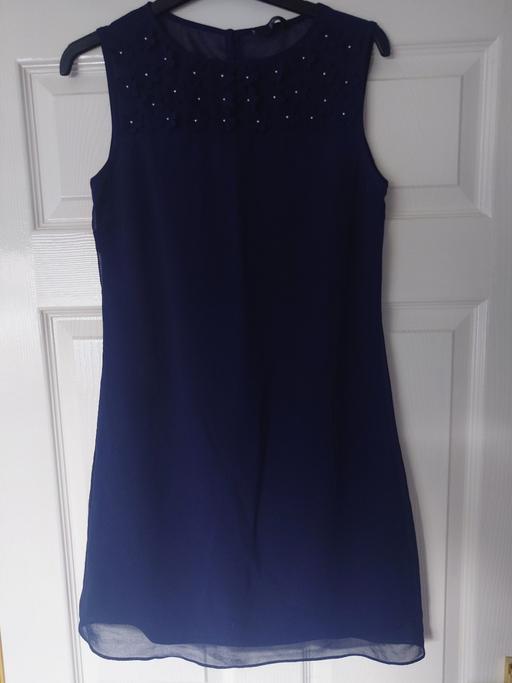  — Women's navy dress size 6