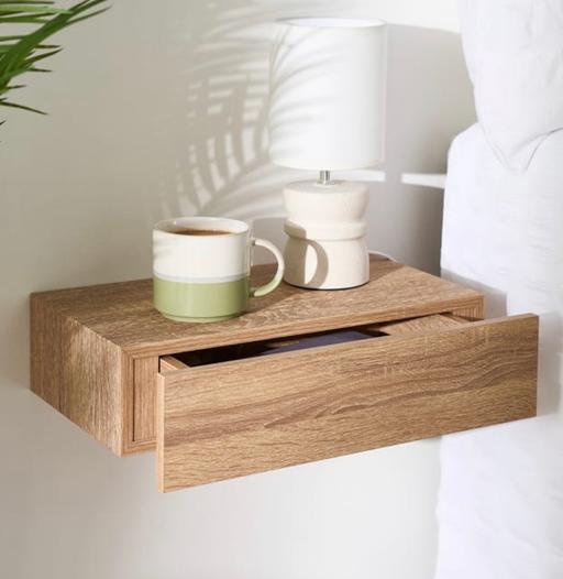  — Floating drawer shelf