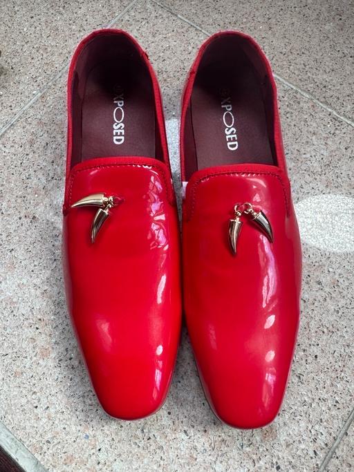  — Red Shiny Shoes