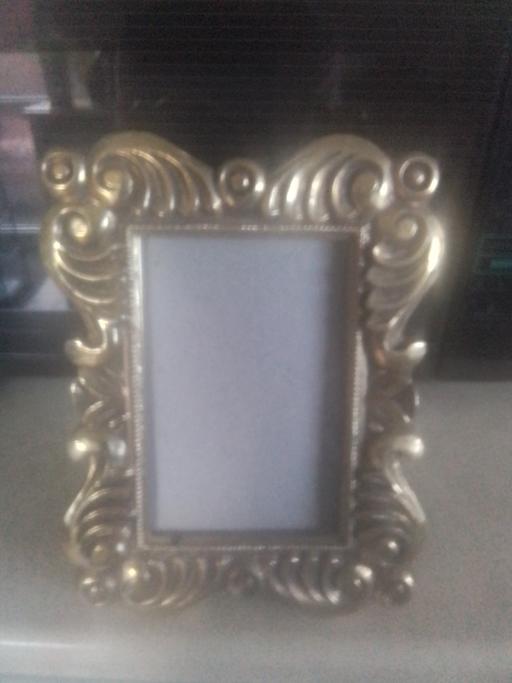  — PICTURE FRAME