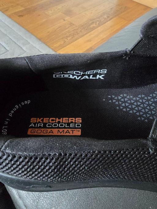  — sketchers slip ons