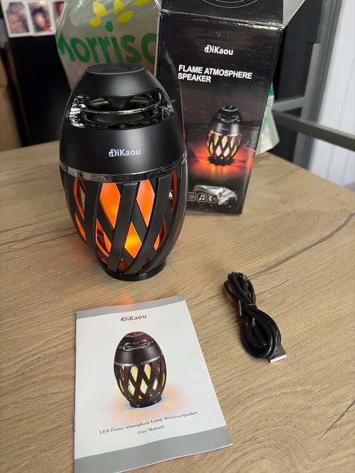  — Dikaou flame atmosphere speaker
