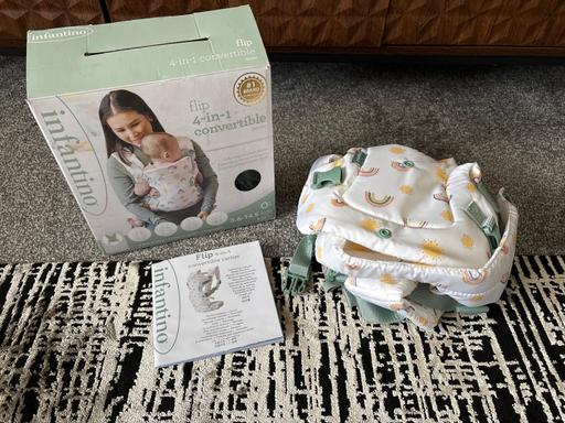  — Infantino Flip Baby Carrier - rainbow Print
