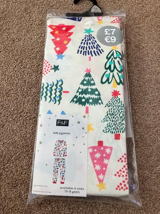  — Christmas children s pyjamas , unopened