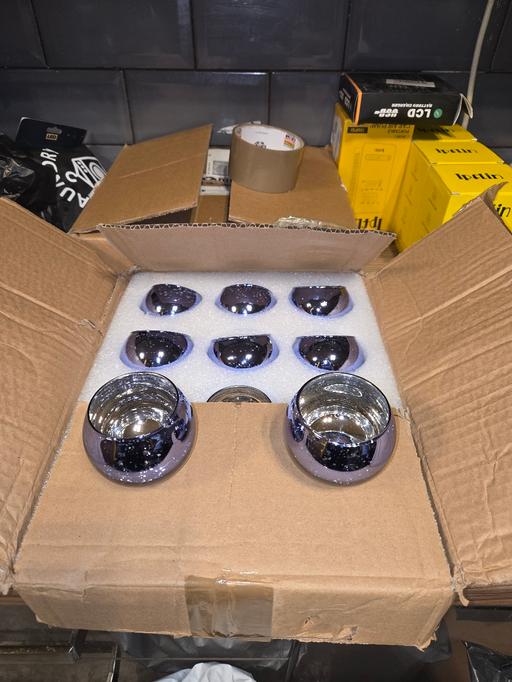  — 12 blu tea light holders